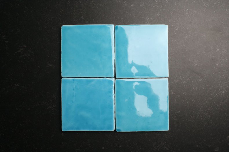 Handvorm 10x10 licht blauwe tegels