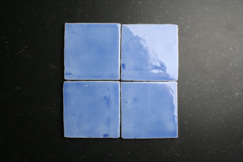 Handvorm 10x10 transparant licht blauwe tegels