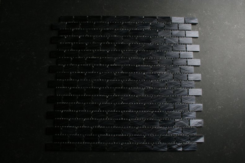 Aluminium geborsteld donker mozaiek